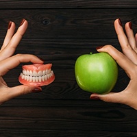 Dental bridges and dental implants are two alternatives to dentures